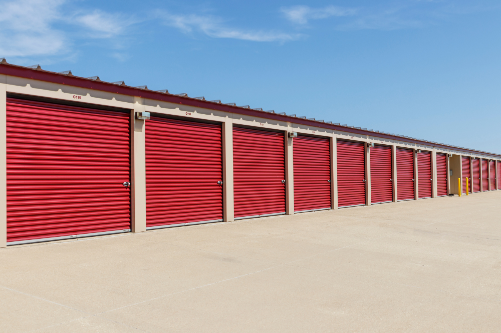 Red storage units at a self-storage facility in Hooksett, NH, offering local storage options for residents and businesses.